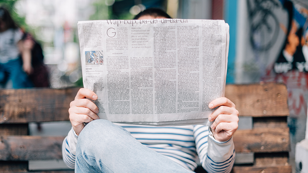 reading a newspaper